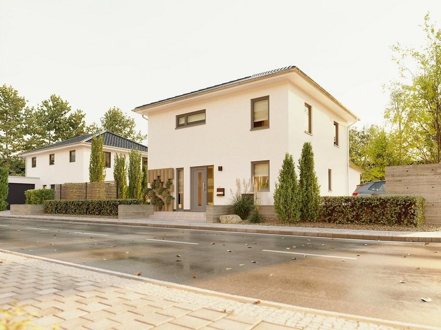 Stadthaus Flair 124 mit Staffelgeschoss – elegante Straßenansicht Frontalansicht des Stadthauses Flair 124 mit Staffelgeschoss und Eingangsbereich, eingerahmt von Vorgarten und moderner Fassadengestaltung